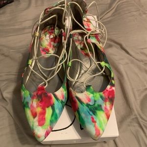 Size 7 tie up flats , multicolored. Worn once with a dress. Very stylish